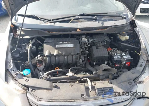 2011 Honda Insight z USA, uszkodzony, nr VIN JHMZE2H36BS008807